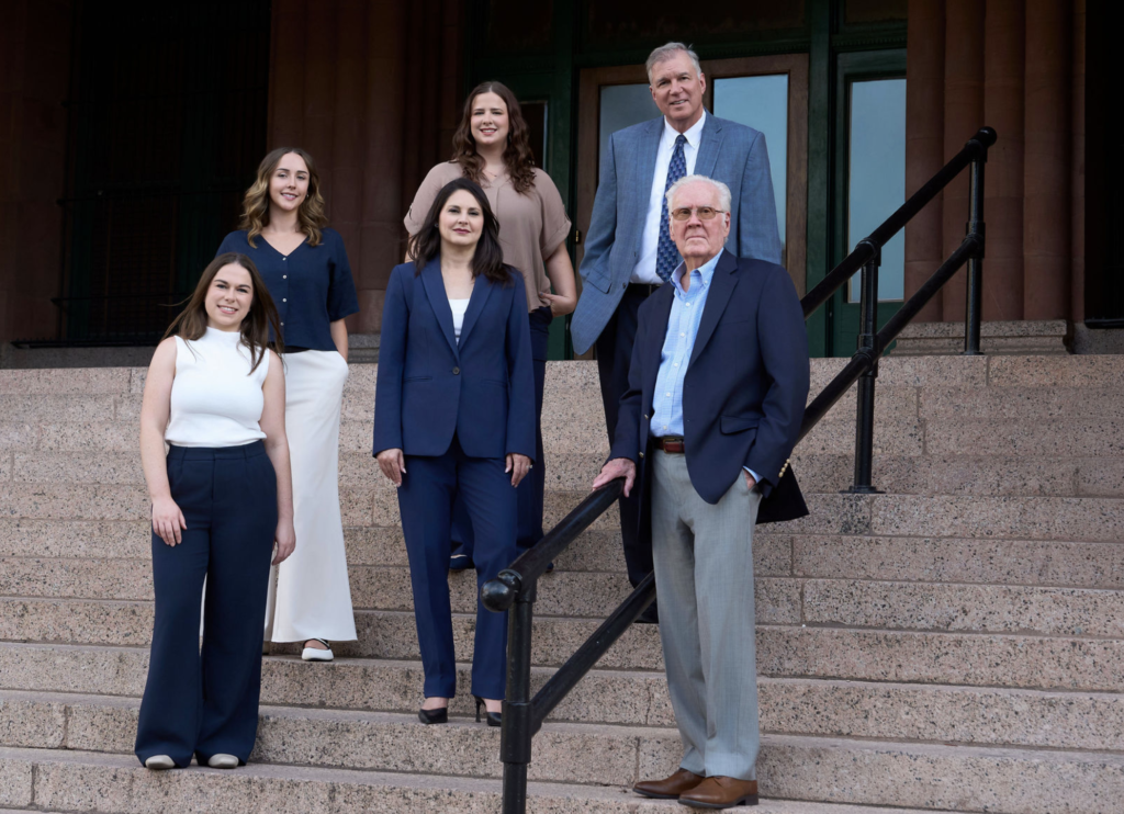 How to Prepare for Corporate Headshots at Your Next Conference or Company Event 29 Corporate team portrait of six professionals photographed on the steps of a building in San Antonio.